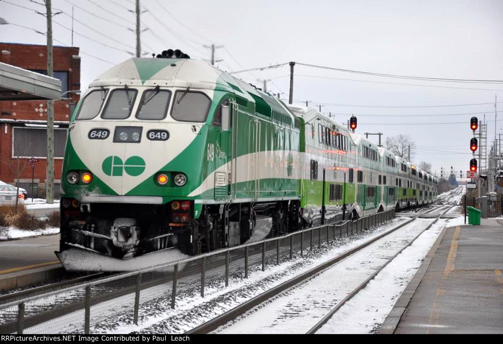 Outbound commuter shoves out of the station